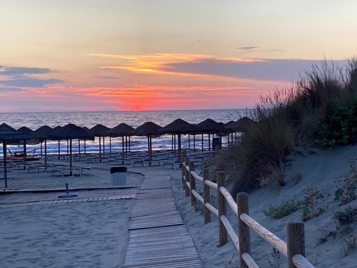 Toscana Charme Resort Tirrenia Dış mekan fotoğraf Sunset at Sabinillas
