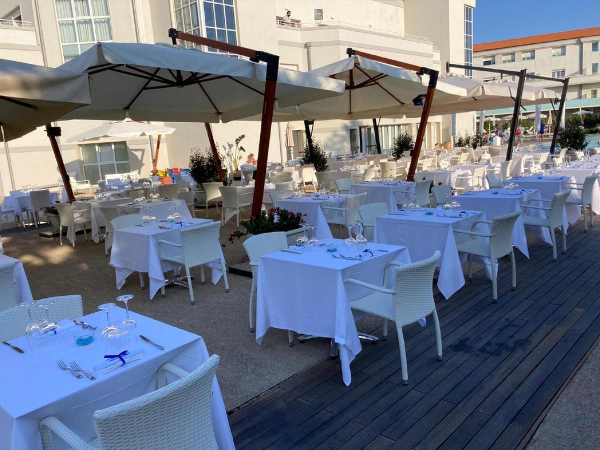 Toscana Charme Resort Tirrenia Dış mekan fotoğraf Restaurant in Port of Skala