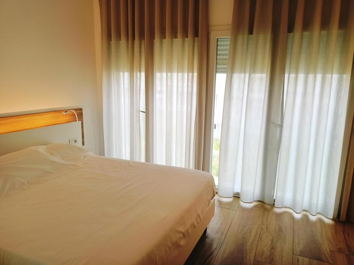 Toscana Charme Resort Tirrenia Dış mekan fotoğraf A bedroom at the hotel