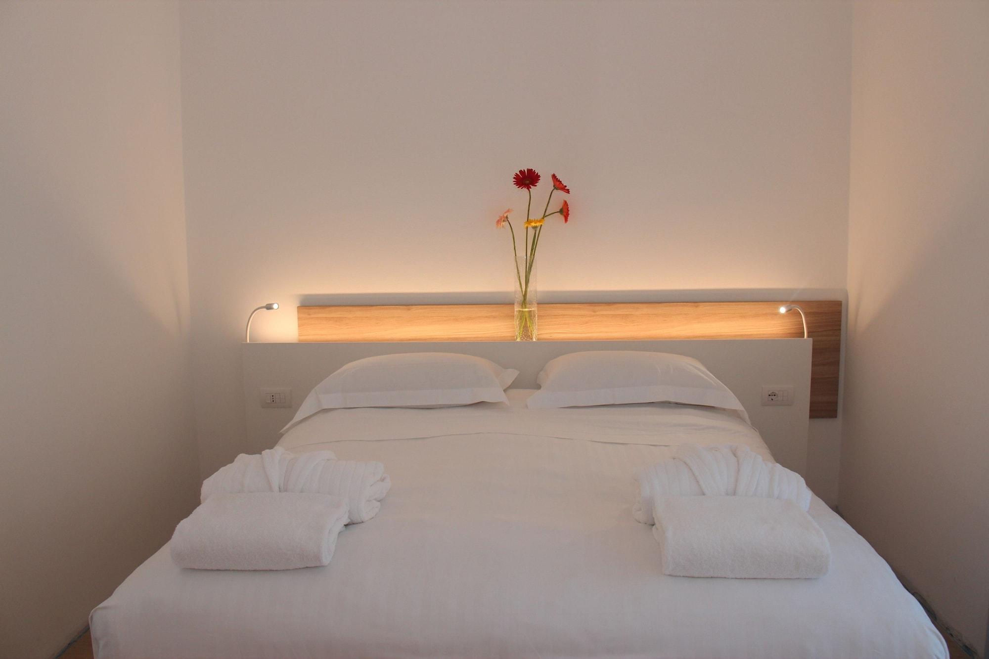 Toscana Charme Resort Tirrenia Dış mekan fotoğraf A bedroom at the hotel