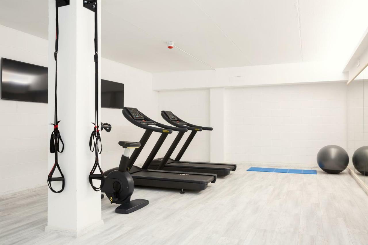 Toscana Charme Resort Tirrenia Dış mekan fotoğraf A Peloton bike in a gym